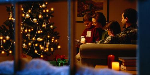 View Through a Window of a Family on Christmas Eve